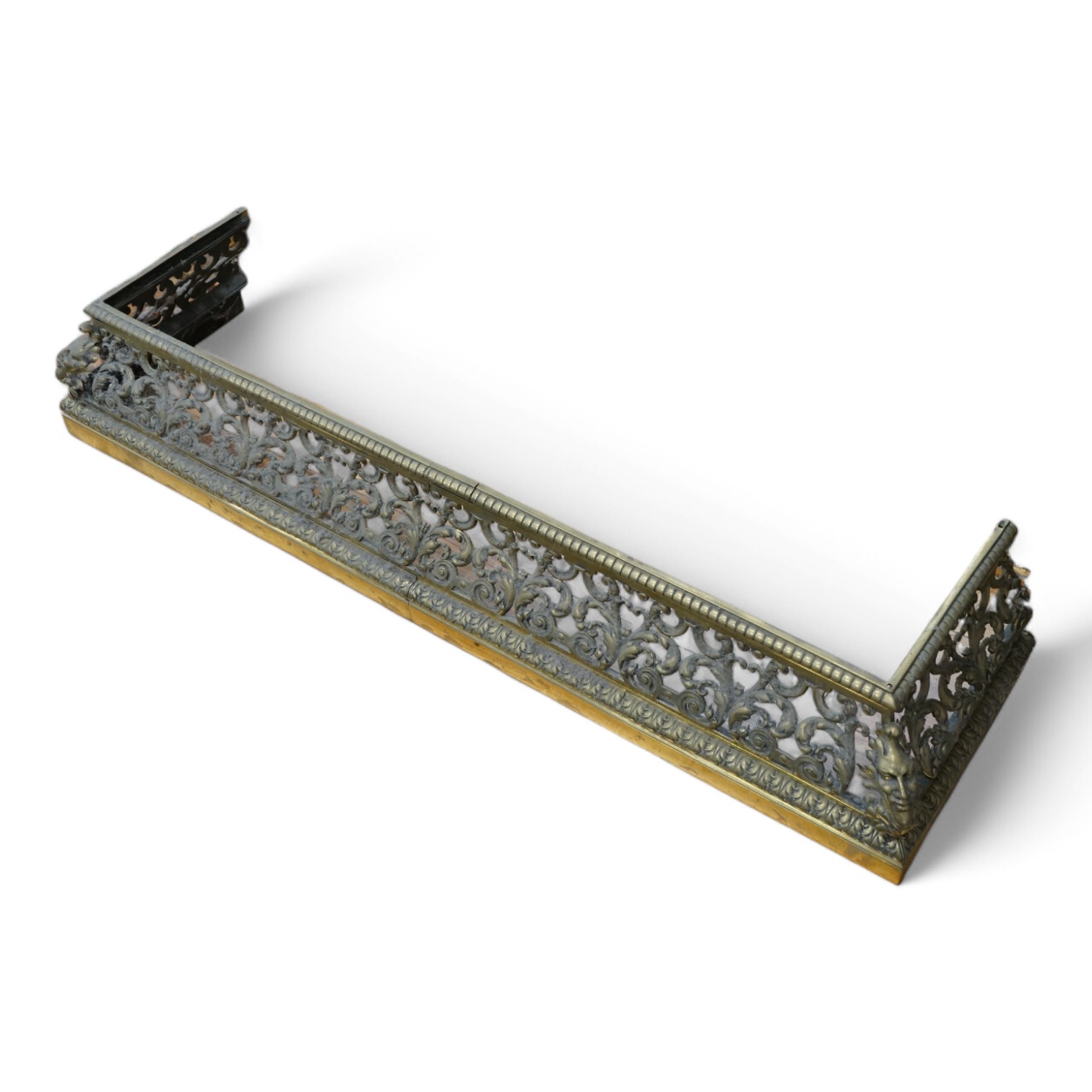A 19th century cast bronze fender, signed Hollenbach, Wien, 98cm x 27cm deep. Condition - good